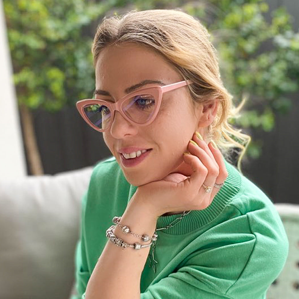 @deni_style_fashion_blogger wearing Milah by Glamour Glasses featuring a bold salmon pink cat eye frame - close up shot