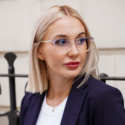 @jasmine.pring wearing Crystal Clear by Glamour Glasses featuring a transparent frame, gold & silver two tone temples